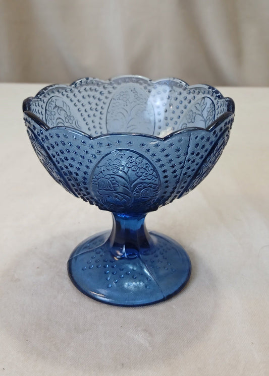 Liten blå glass skål på stett