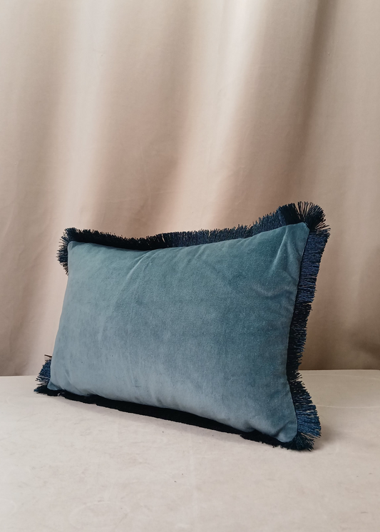 Liten blå og hvit pute