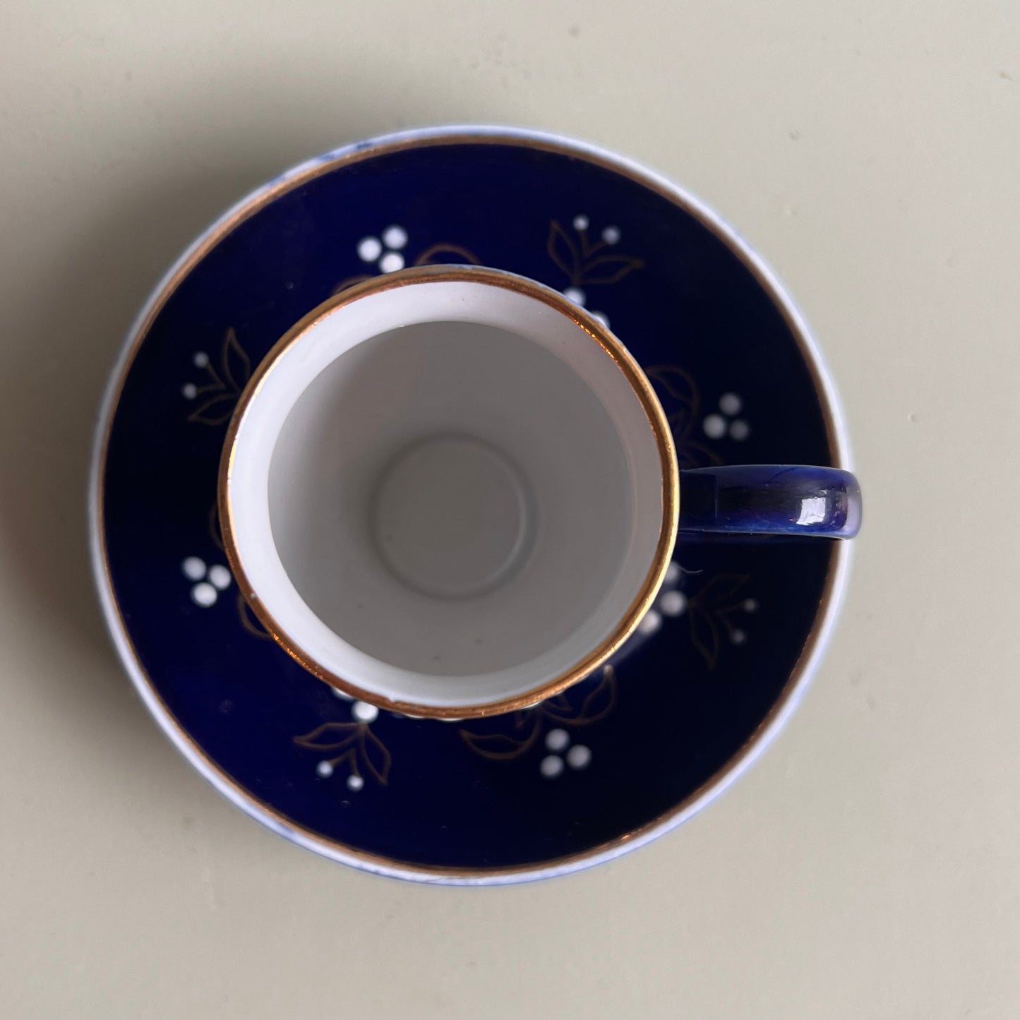 Blå espresso kopp med fat