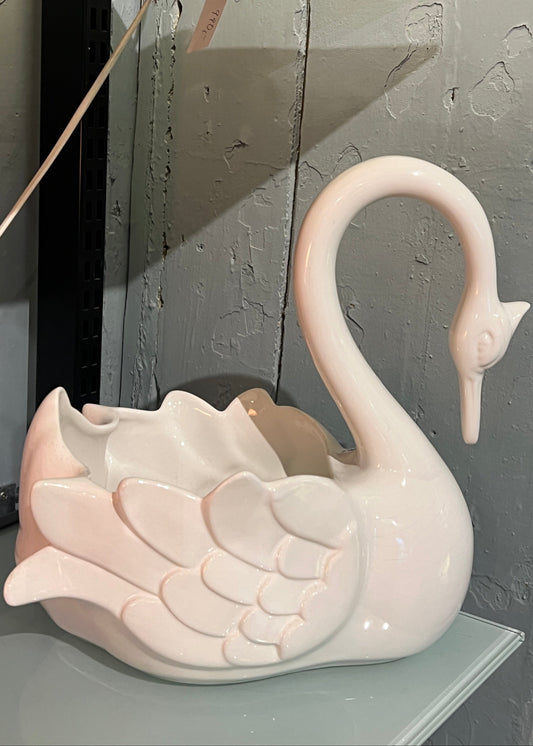 Stor svane potteskjuler